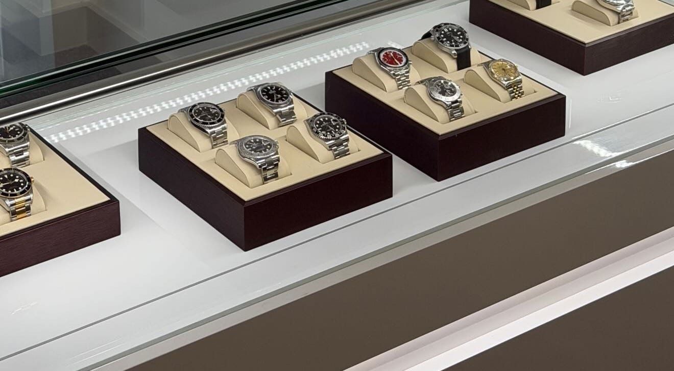 Rolex and Tudor watches in the display cabinet at the LKL Watches showroom in Liverpool
